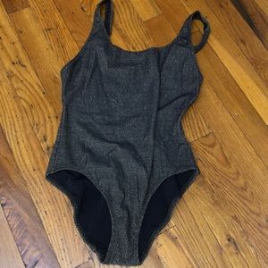 The Anne Marie black and gold glitter size M